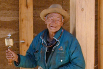 210px-Yunnan-Old-Man-with-Prayer-Wheel